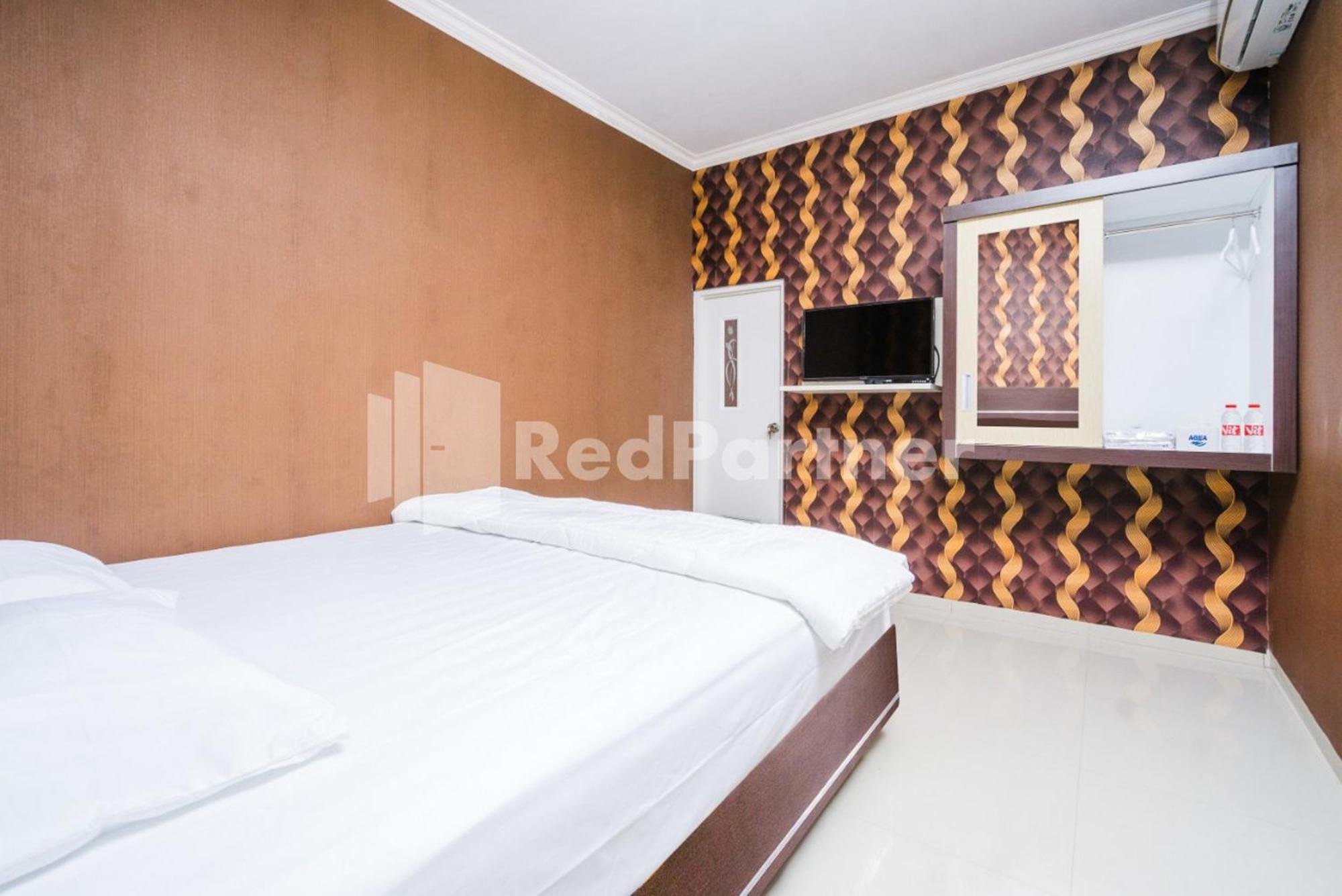 Отель Omah Kalimosodo Mitra Reddoorz Near Stasiun Malang Kota Baru Экстерьер фото